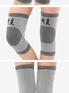 Grey bamboo charcoal knee warmers detail shot showing knit texture and support zone.