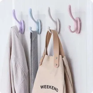 Strong adhesive wall hooks for hanging clothes, keys, and bags behind doors or in hallways.