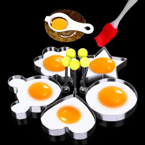 Stainless steel egg frying mold set, pancake rings and kitchen cooking tools for breakfast.