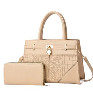 Stylish women's handbag set featuring crocodile embossed tote bag and matching wallet in beige.