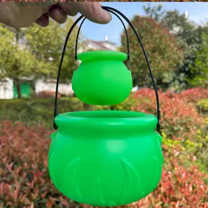Green plastic witch cauldron for St. Patrick's Day and party decorations, detail view.