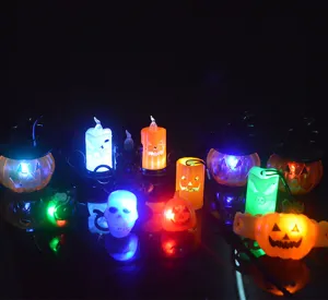 Halloween pumpkin glowing toy detail showing colorful LED night lights and flashing necklaces.