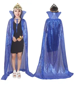 Close-up detail showing the back and front view of the glittering blue sequin party cape.