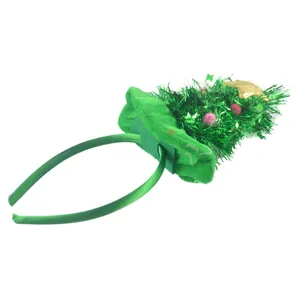 Festive Christmas tree headband with shiny green tinsel and star for holiday party.