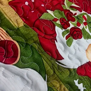 Close-up detail of quilted tote bag fabric featuring vibrant digital print bird and floral pattern.