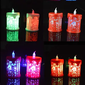 Christmas LED electronic candle light detail, glowing Santa Claus pattern night lamp ornament.