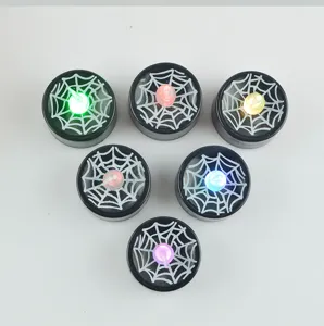 Halloween LED tea light candles with spider web design, plastic flameless decorative lights.