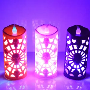 Bougies électroniques LED d'Halloween avec crâne et toile d'araignée creuse pour décoration.