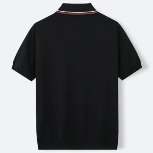 Back view of men's black short-sleeve knit Polo with striped collar detail.