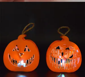 LED Halloween pumpkin lantern lights for party decoration, glowing hollow hanging decor.