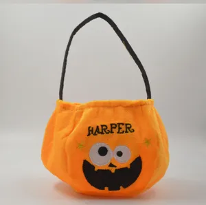 Halloween trick or treat candy bag plush orange gift tote basket with cute ghost face design