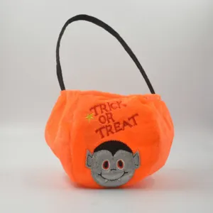 Halloween plush trick or treat candy bag with cute vampire face, ideal kids gift tote.