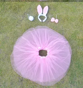 Pink bunny costume set including tutu skirt, ear headband, tail and bow tie for party.