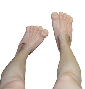 Funny giant foot novelty slippers detail view, soft vinyl prank shoes for parties and events.