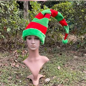 Close-up detail of the long red and green striped Christmas elf plush hat holiday decor.