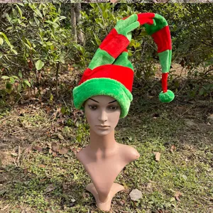 Red and green striped plush Christmas elf hat detail view, soft velvet holiday costume.