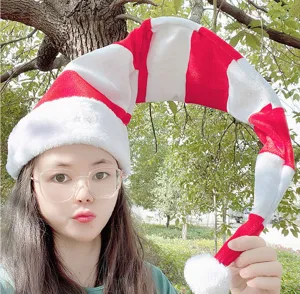 Extra long plush red white striped Christmas hat, soft cozy holiday costume accessory detail.