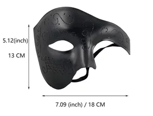 Vue détaillée du masque de mascarade noir avec motifs pailletés et sangle élastique.