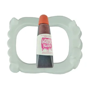 Halloween fake blood bottle prop with vampire teeth toy, ideal for cosplay parties and pranks.