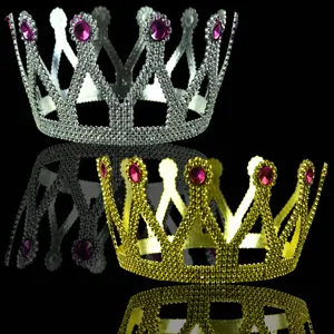 King crown party prop, gold and silver plastic costume headpiece with pink gems for Halloween.