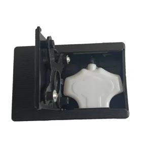 Close-up view of the prank water spray camera toy internal mechanism and plastic case detail.