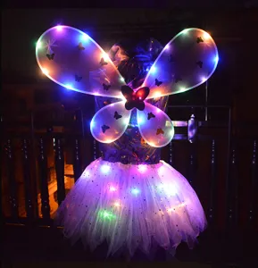 Glowing butterfly wings and tutu skirt set with colorful LED lights for kids party.