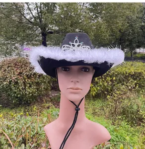 Black western cowboy hat with white feathers and tiara crown for stage performance.