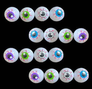 Detailed view of Halloween plastic eyeball toys with colorful pupils and scary blood designs