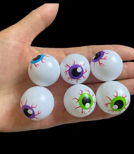 Plastic eyeball toys with colorful irises and red veins for Halloween party props and DIY.