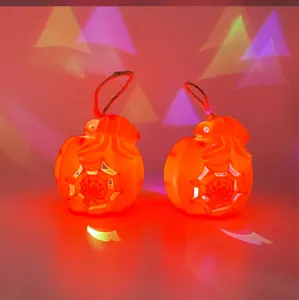 Halloween pumpkin hanging light, spider web hollow design, glowing party decoration prop detail.