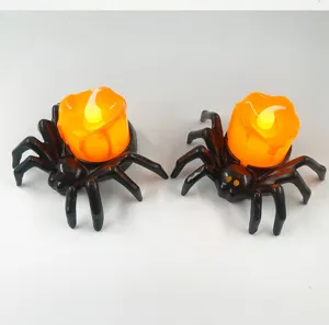 Halloween spider LED candle light, glowing orange flameless tea light for party decor.