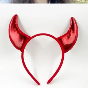 Red devil horns headband detail, glossy party hair hoop for Halloween costume dress up.
