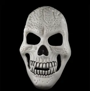 Detailed view of white skull mask texture, scary Halloween facial prop for parties and costumes.