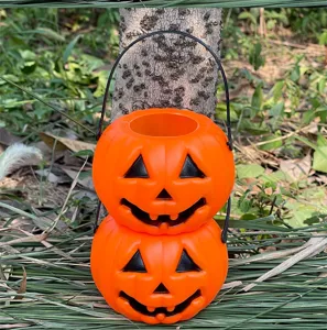 Λεπτομέρεια κάδος καραμέλας κολοκύθας Halloween, φορητό δοχείο για γιορτινή διακόσμηση.