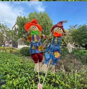 Cute autumn scarecrow doll decoration for garden yard festival and outdoor party setup props.
