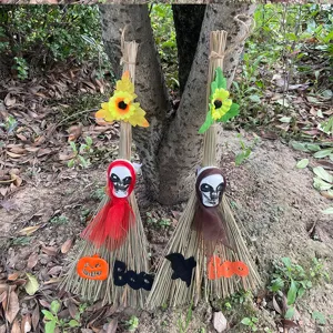 Halloween witch broom decoration prop with skull and pumpkin design for spooky party events.