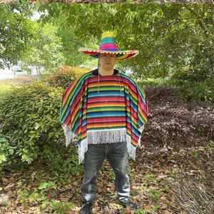 Adult colorful striped Mexican poncho cape party costume with matching hat detail view.
