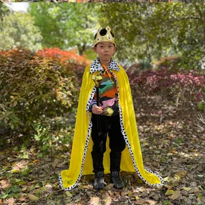 Kids royal king cape costume outdoor scene detail showing yellow cloak, crown and scepter.