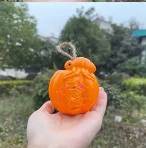 Halloween pumpkin spider pendant hanging light decoration detail shot orange plastic toy