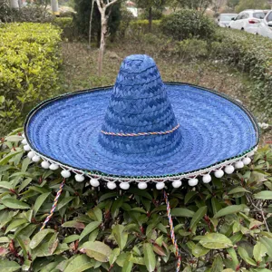 Blue Mexican Sombrero straw hat with colorful braided rope and pom pom festival party dress up.