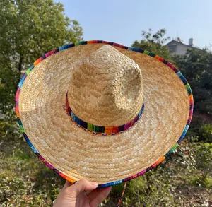Adult Mexican straw hat with colorful woven brim, perfect for holiday carnival party costumes.