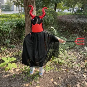 Kids Halloween devil costume set with black cape, red horns headband and trident prop.