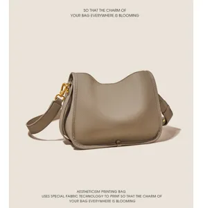 Minimalist soft leather shoulder bag for women, stylish daily crossbody bag with gold hardware.