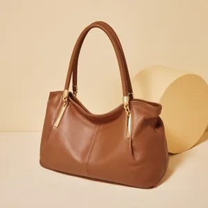 Premium brown leather shoulder bag for women, elegant hobo tote handbag with gold hardware.