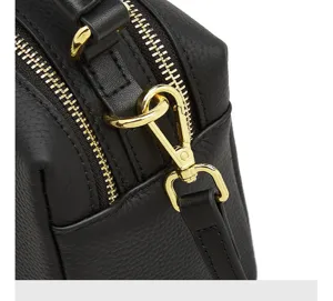 Black leather shoulder bag detail close-up showcasing premium gold zipper and hardware clasp.