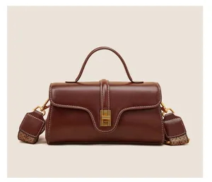 Classic brown leather top handle shoulder bag for women, stylish casual crossbody purse.