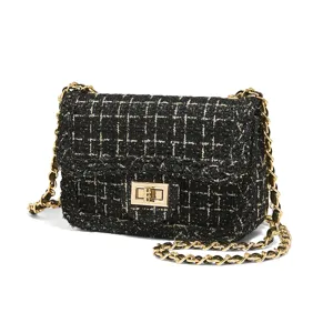 Classic black tweed shoulder bag with gold chain strap, elegant flap design for women.