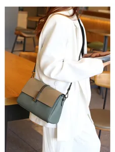 Stylish women genuine leather shoulder bag contrast color crossbody bag for daily fashion wear.
