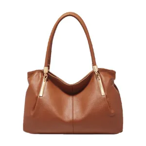 Stylish brown leather shoulder bag for women, elegant daily handbag with gold tone hardware.