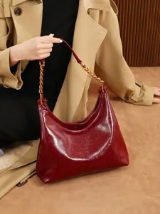 Red patent leather underarm shoulder bag for women, stylish chain strap hobo purse daily use.